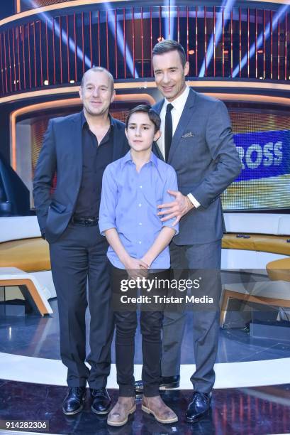 Heino Ferch, Kai Pflaume and a candidate kid during the TV Show 'Klein gegen Gross' on February 4, 2018 in Berlin, Germany.
