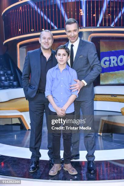 Heino Ferch, Kai Pflaume and a candidate kid during the TV Show 'Klein gegen Gross' on February 4, 2018 in Berlin, Germany.