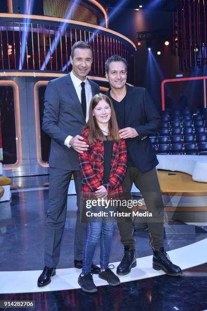Kai Pflaume and Dieter Nuhr with a candidate kid during the TV Show 'Klein gegen Gross' on February 4, 2018 in Berlin, Germany.