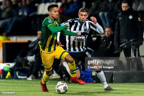 Tyronne Ebuehi of ADO Den Haag, Kristoffer Peterson of Heracles Almelo during the Dutch Eredivisie match between Heracles Almelo and ADO Den Haag at...