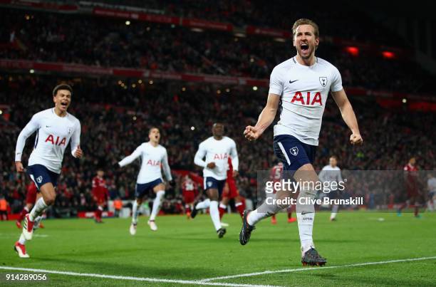 Harry Kane of Tottenham Hotspur celebrates with team mates after scoring his sides second goal and his 100th Premier League goal during the Premier...