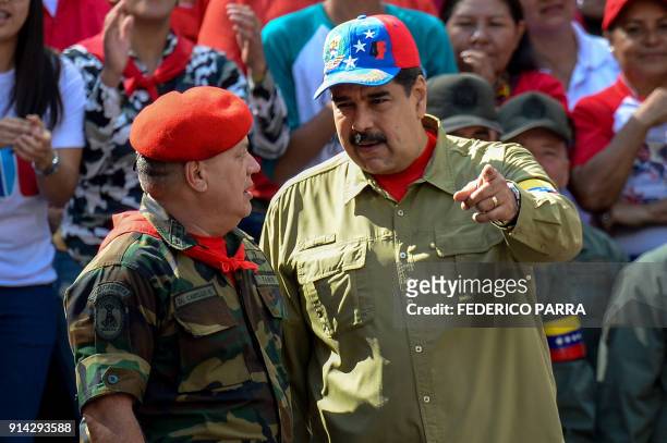Venezuelan President Nicolas Maduro talks with Constituent Assembly member Diosdado Cabello during a rally to commemorate the 26th anniversary of...
