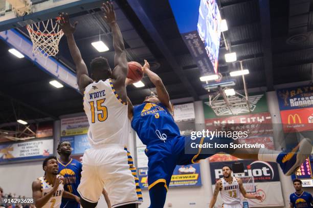 Cal State Bakersfield Roadrunners center Fallou Ndoye goes up to block the shot from UMKC Kangaroos guard Brandon McKissic during the game between...