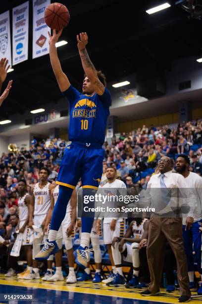 Kangaroos guard Broderick Robinson hits a three point shot as the buzzer sounds to close out the first half during the game between the UMKC Roos and...