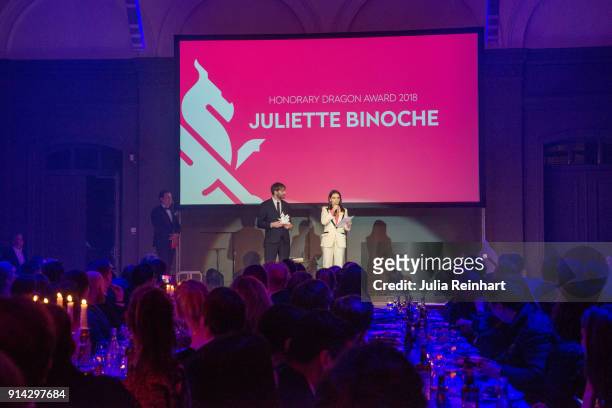 Actress Juliette Binoche joins Jonas Holmberg, Artistic Director of the Gothenburg International Film Festival on stage to accept the Honorary Dragon...