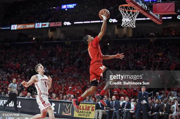 Maryland's Anthony Cowan Jr. Shoots for two points ahead of Wisconsin's Brevin Pritzl in the first half on Sunday, Feb. 4, 2018 at Xfinity Center in...