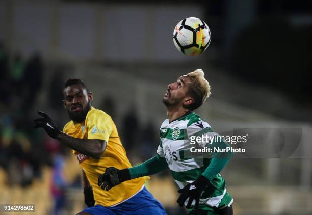 Sporting's midfielder Ruben Ribeiro vies with Estoril's defender Dankler during the Portuguese League football match between Estoril Praia and...