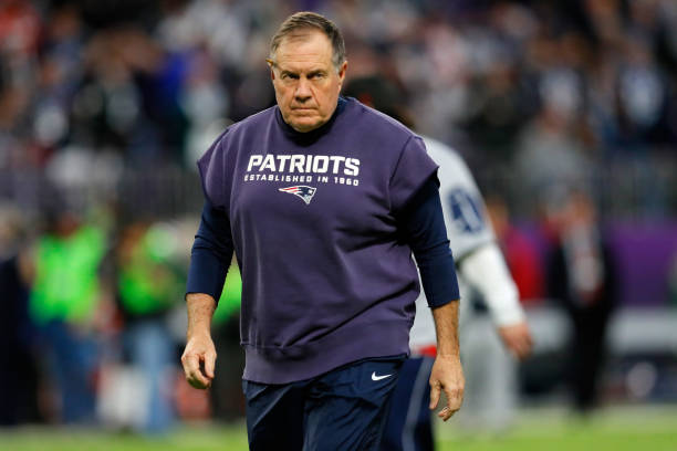 Head coach Bill Belichick of the New England Patriots looks on during warm-ups prior to Super Bowl LII at U.S. Bank Stadium on February 4, 2018 in...