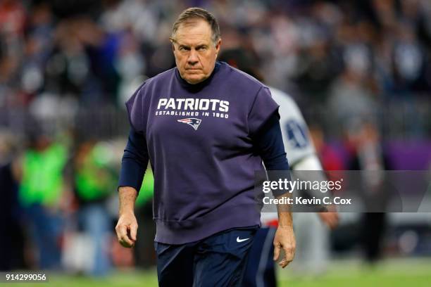 Head coach Bill Belichick of the New England Patriots looks on during warm-ups prior to Super Bowl LII at U.S. Bank Stadium on February 4, 2018 in...