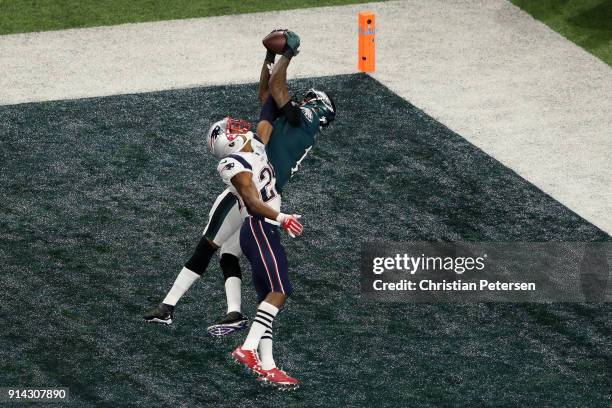 Alshon Jeffery of the Philadelphia Eagles catches a 34-yard touchdown pass against Eric Rowe of the New England Patriots in the first quarter of...