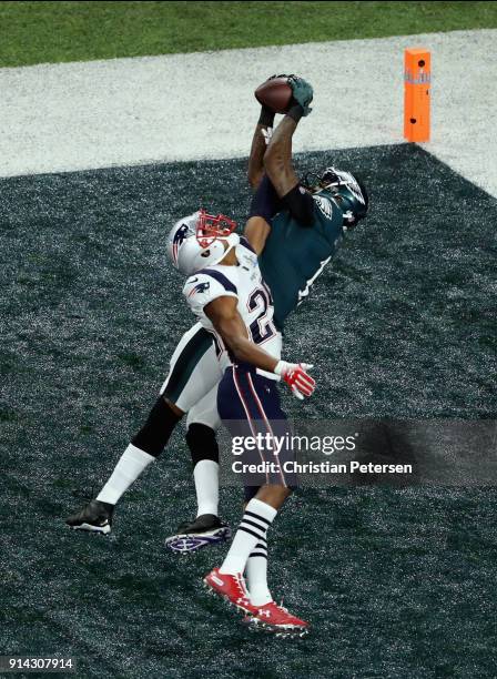 Alshon Jeffery of the Philadelphia Eagles catches a 34-yard touchdown pass against Eric Rowe of the New England Patriots in the first quarter of...