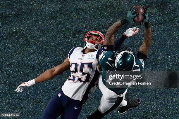 Alshon Jeffery of the Philadelphia Eagles catches a 34 yard pass, over Eric Rowe of the New England Patriots, for a touchdown during the first...