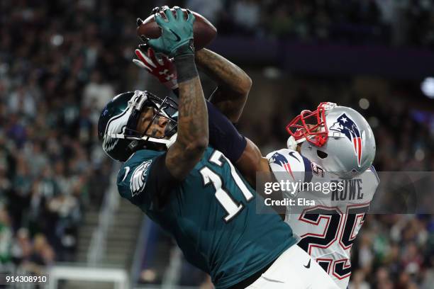 Alshon Jeffery of the Philadelphia Eagles catches a 34-yard touchdown pass against Eric Rowe of the New England Patriots in the first quarter of...