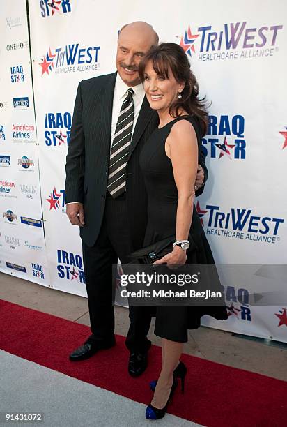 Dr. Phil and Robin McGraw arrive at "A Night of Honour" Hosted By Dr. Phil McGraw at Universal Hilton Hotel on October 4, 2009 in Universal City,...