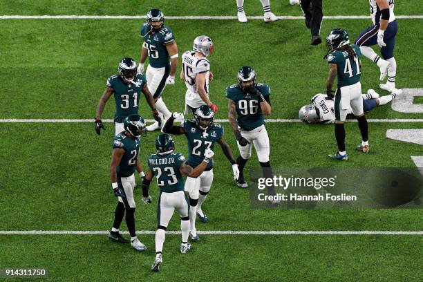 Malcolm Jenkins of the Philadelphia Eagles celebrates with Rodney McLeod after tackling Brandin Cooks of the New England Patriots during the second...