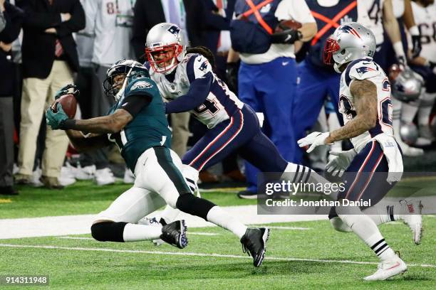 Alshon Jeffery of the Philadelphia Eagles makes a catch defended by Stephon Gilmore of the New England Patriots in the second quarter of the Super...