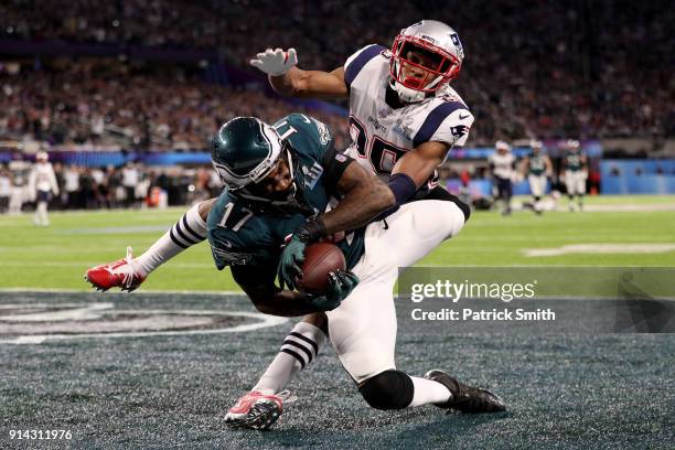 Alshon Jeffery of the Philadelphia Eagles catches a 34 yard pass, over Eric Rowe of the New England Patriots, for a touchdown during the first...