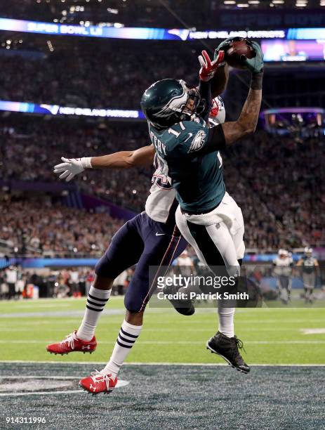 Alshon Jeffery of the Philadelphia Eagles catches a 34 yard pass, over Eric Rowe of the New England Patriots, for a touchdown during the first...