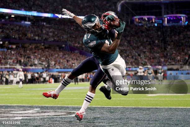 Alshon Jeffery of the Philadelphia Eagles catches a 34 yard pass, over Eric Rowe of the New England Patriots, for a touchdown during the first...