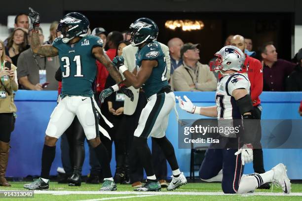 Jalen Mills and Corey Graham of the Philadelphia Eagles celebrate after a 21-yard touchdown reception during the second quarter against the New...