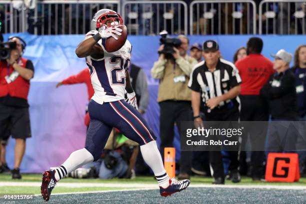 James White of the New England Patriots runs the ball for a 26-yard touchdown pass against the Philadelphia Eagles during the second quarter in Super...