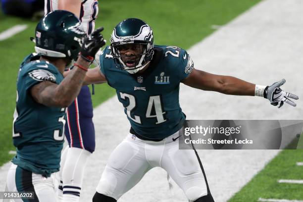 Jalen Mills and Corey Graham of the Philadelphia Eagles celebrate the play against the New England Patriots during the second quarter in Super Bowl...