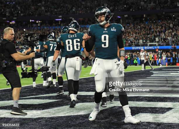 Nick Foles of the Philadelphia Eagles reacts after a 1-yard touchdown reception against the New England Patriots during the second quarter in Super...