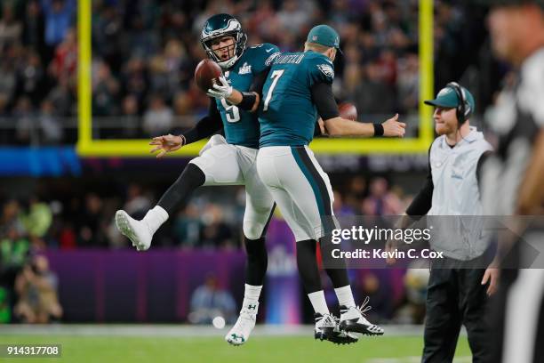 Nick Foles of the Philadelphia Eagles is congratulated by his teammate Nate Sudfeld after his 1-yard touchdown reception during the second quarter...