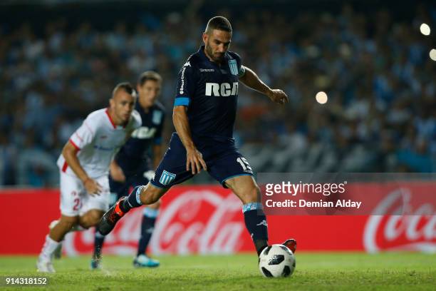 Lisandro Lopez of Racing Club shots to score the second goal of his team during a match between Racing Club and Huracan as part of Superliga...