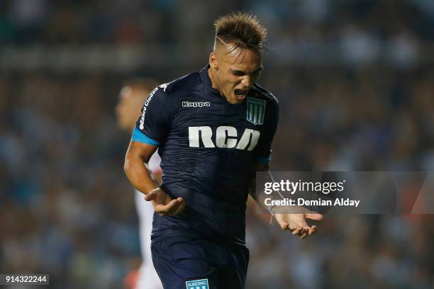 Lautaro Martinez of Racing Club celebrates after scoring the third goal of his team during a match between Racing Club and Huracan as part of...