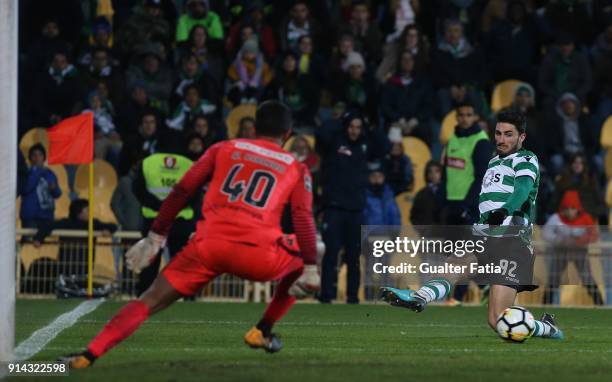 Sporting CP defender Cristiano Piccini from Italy with GD Estoril Praia goalkeeper Renan Ribeiro from Brazil in action during the Primeira Liga match...