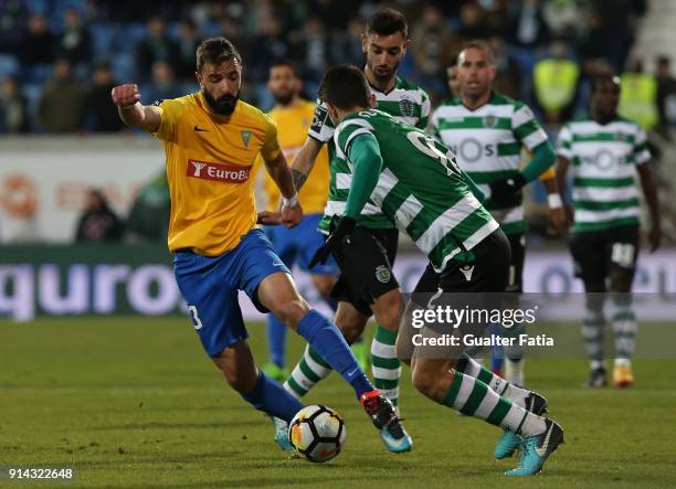 Estoril Praia midfielder Goncalo Santos from Portugal with Sporting CP midfielder Bruno Fernandes from Portugal in action during the Primeira Liga...