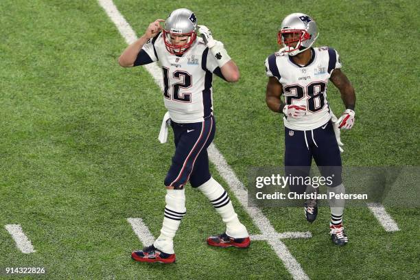 Tom Brady and James White of the New England Patriots react during the second quarter against the Philadelphia Eagles in Super Bowl LII at U.S. Bank...
