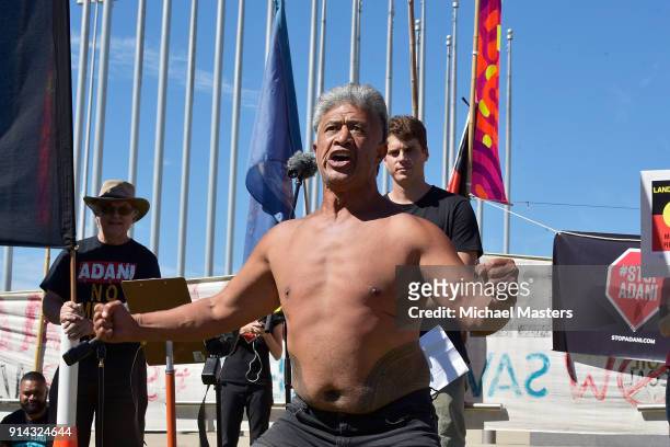 Tuulenan Luli performs a ceremonial dance before a crowd of protesters gathered in front of Parliament House to campaign against the construction of...