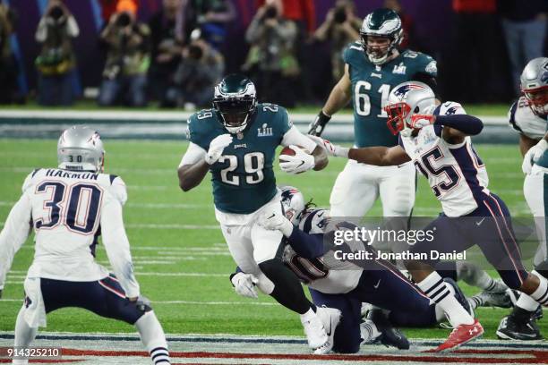 LeGarrette Blount of the Philadelphia Eagles carries the ball defended by Malcom Brown of the New England Patriots in the third quarter of Super Bowl...