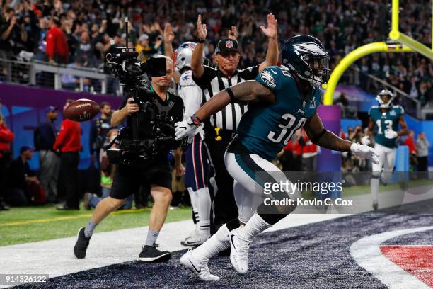 Corey Clement of the Philadelphia Eagles celebrates scoring a 22-yard touchdown reception against the New England Patriots in the third quarter of...
