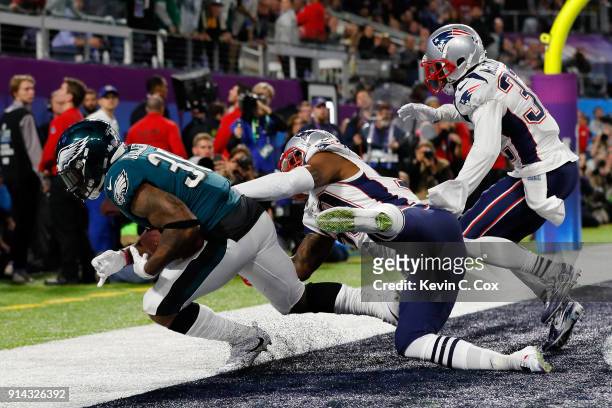 Corey Clement of the Philadelphia Eagles scores a 22-yard touchdown reception against the New England Patriots in the third quarter of Super Bowl LII...