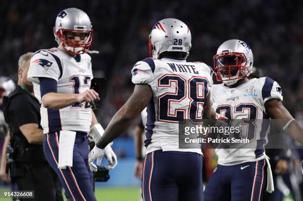 James White of the New England Patriots celebrates with teammates after a 26-yard touchdown run against the Philadelphia Eagles during the second...