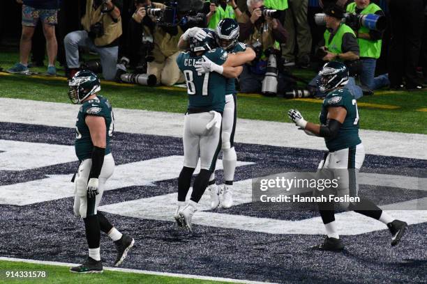 Trey Burton of the Philadelphia Eagles celebrates with Brent Celek after a touchdown against the New England Patriots during the second quarter in...