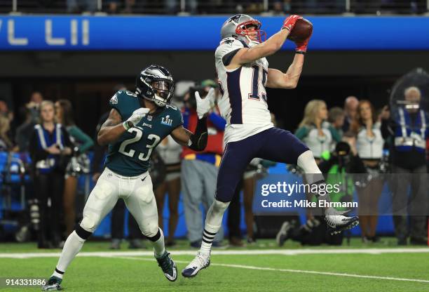 Chris Hogan of the New England Patriots catches a 26 yard touchdown pass against Rodney McLeod of the Philadelphia Eagles during the third quarter in...