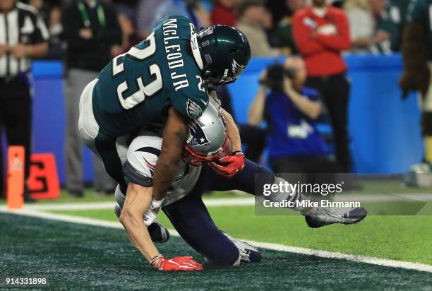 Chris Hogan of the New England Patriots catches a 26 yard touchdown pass against Rodney McLeod of the Philadelphia Eagles during the third quarter in...