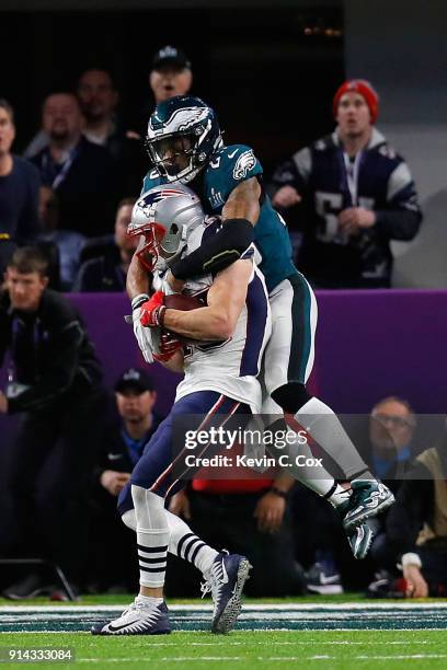 Chris Hogan of the New England Patriots is tackled by Rodney McLeod of the Philadelphia Eagles during the third quarter in Super Bowl LII at U.S....