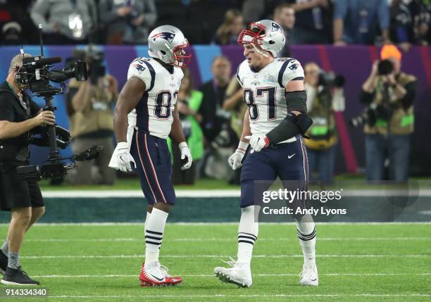 Rob Gronkowski of the New England Patriots celebrates with Dwayne Allen after a touchdown against the Philadelphia Eagles during the third quarter in...