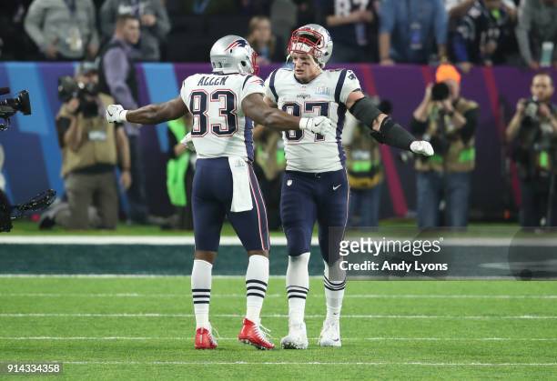 Rob Gronkowski of the New England Patriots celebrates with Dwayne Allen after a touchdown against the Philadelphia Eagles during the third quarter in...