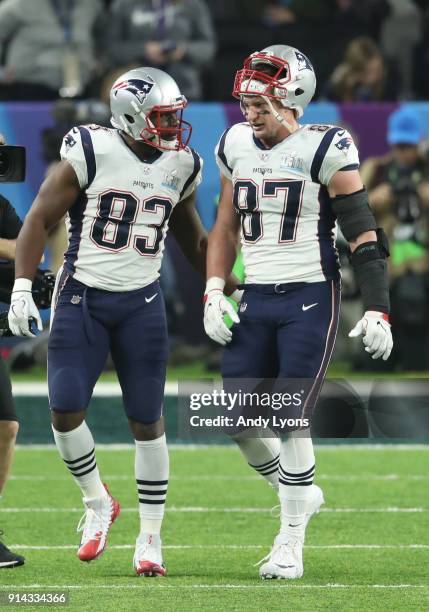 Rob Gronkowski of the New England Patriots celebrates with Dwayne Allen after a touchdown against the Philadelphia Eagles during the third quarter in...