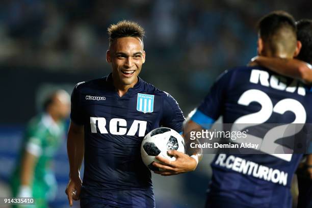 Lautaro Martinez of Racing Club celebrates after scoring the fourth goal of his team during a match between Racing Club and Huracan as part of...