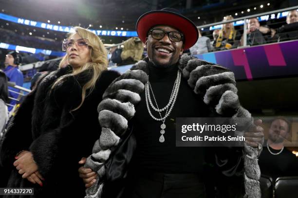 Boxer Floyd Mayweather Jr. Looks on during Super Bowl LII between the New England Patriots and the Philadelphia Eagles at U.S. Bank Stadium on...