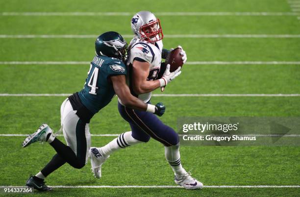 Rob Gronkowski of the New England Patriots catches a pass during the third quarter against Corey Graham of the Philadelphia Eagles in Super Bowl LII...