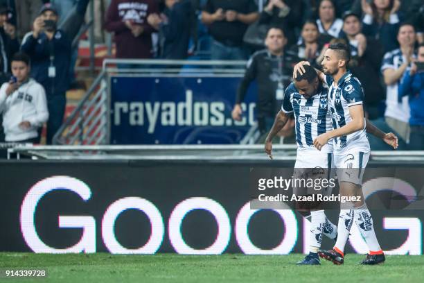 Jonathan Urretaviscaya of Monterrey celebrates with teammate Dorlan Pabon after scoring his team"u2019s fifth goal during the 5th round match between...