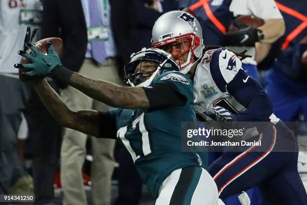 Alshon Jeffery of the Philadelphia Eagles makes a catch defended by Stephon Gilmore of the New England Patriots in the second quarter of the Super...